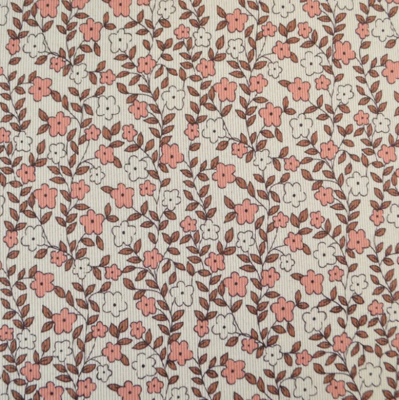 Tissu jersey côtelé bio motif fleurs roses et caramel fond naturel