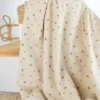 Tissu jersey côtelé fines côtes – Motif fleurs terracotte fond beige