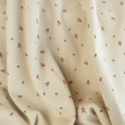 Tissu jersey côtelé fines côtes – Motif fleurs terracotte fond beige