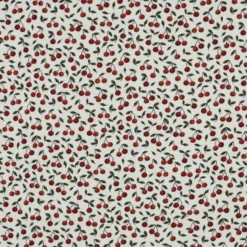 Tissu jersey côtelé motif cerises fond blanc cassé