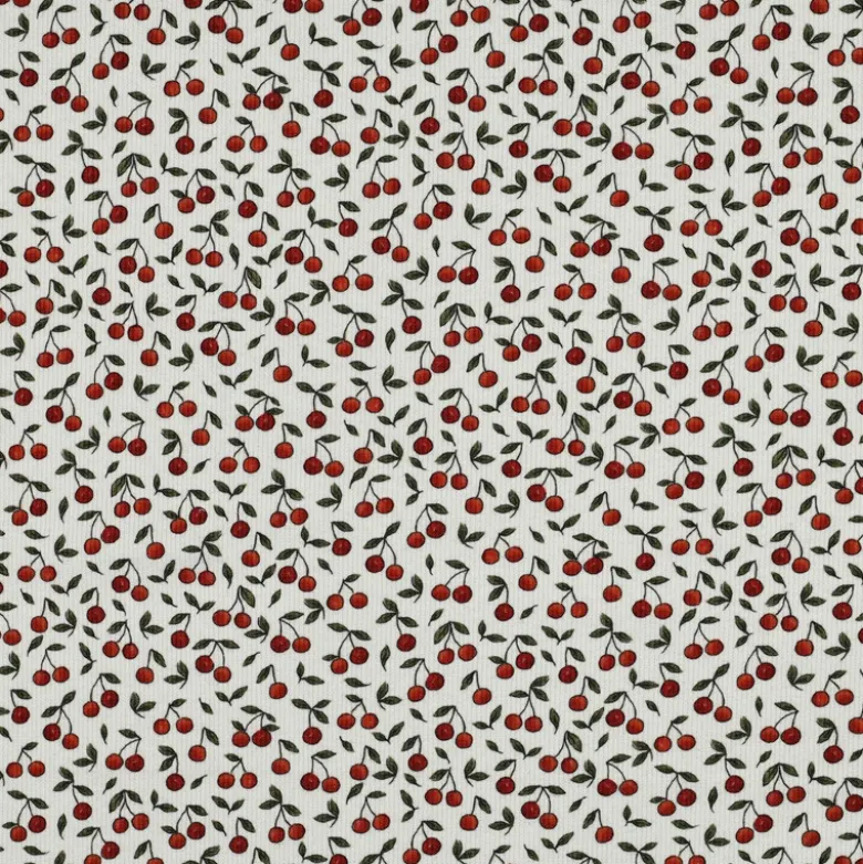 Tissu jersey côtelé motif cerises fond blanc cassé
