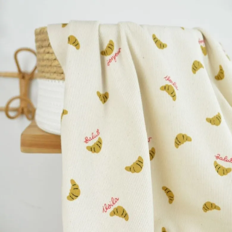 Tissu jersey côtelé motif croissants fond naturel - Poppy fabrics