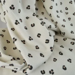 Tissu jersey côtelé motif léopard fond sable