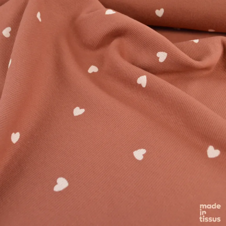 Tissu jersey côtelé motif petits coeurs fond vieux rose - OEKO TEX
