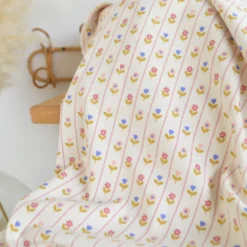 Tissu jersey côtelé petites fleurs et rayures fond écru