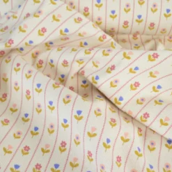 Tissu jersey côtelé petites fleurs et rayures fond écru