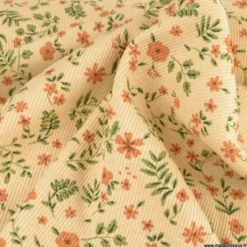 Tissu jersey côtelé Poppy fleuri fond beige - OEKO TEX
