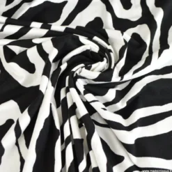 Tissu Jersey de Viscose Mael motifs pétale noir