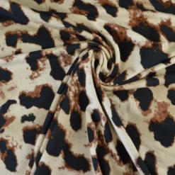 Tissu Jersey de Viscose – Motif léopard fond beige - OEKO TEX