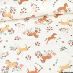 Tissu jersey motifs chevaux et fleurs fond blanc cassé - OEKO TEX