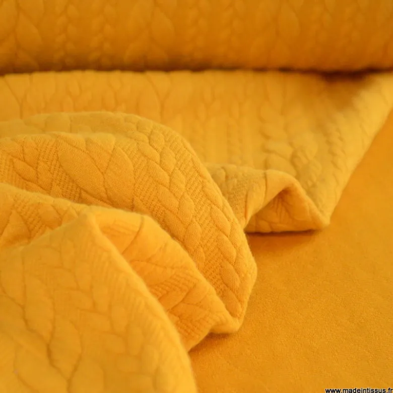 Tissu jersey torsadé jaune moutarde