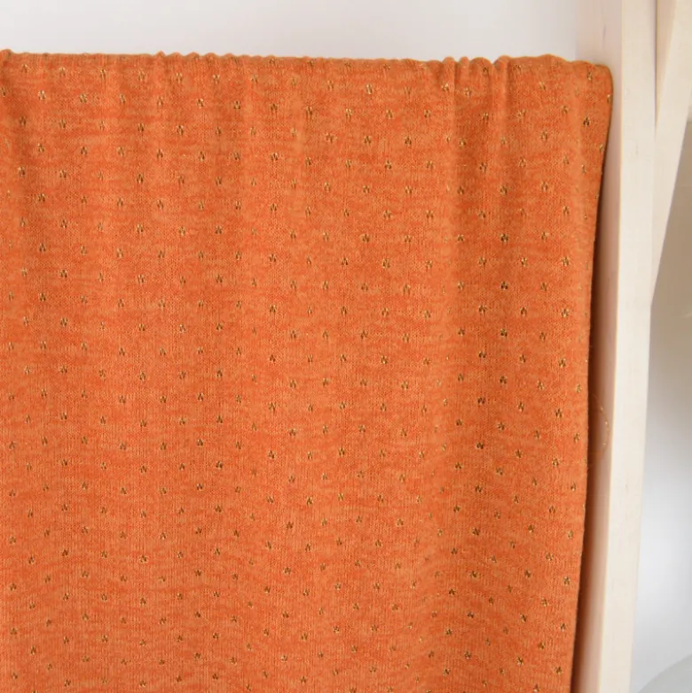 Tissu maille ajouré Lurex coloris Rouille