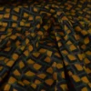 Tissu maille milano motif graphique ocre sur fond kaki - Oeko-Tex