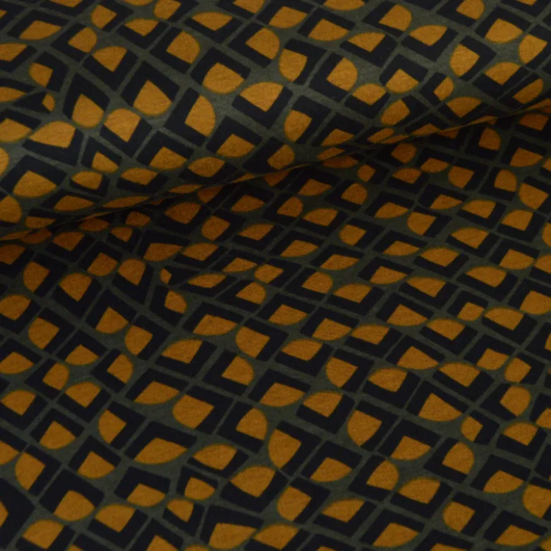 Tissu maille milano motif graphique ocre sur fond kaki - Oeko-Tex