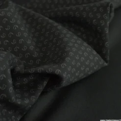 Tissu maille milano motif paisley noir