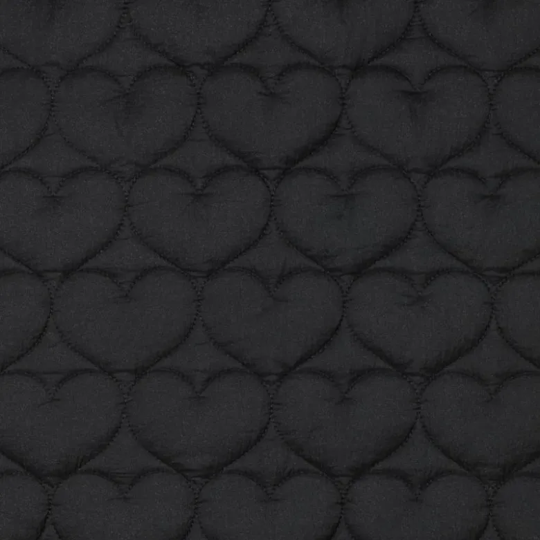 Tissu matelassé Coeurs irisé fond noir