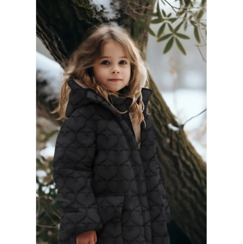 Tissu matelassé Coeurs irisé fond noir