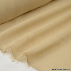 Tissu Mousseline coloris chair .