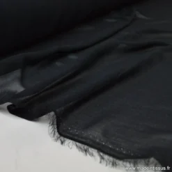 Tissu Mousseline coloris noir .