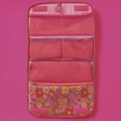 Tissu plastifié imprimé fleurs sur fond fuchsia