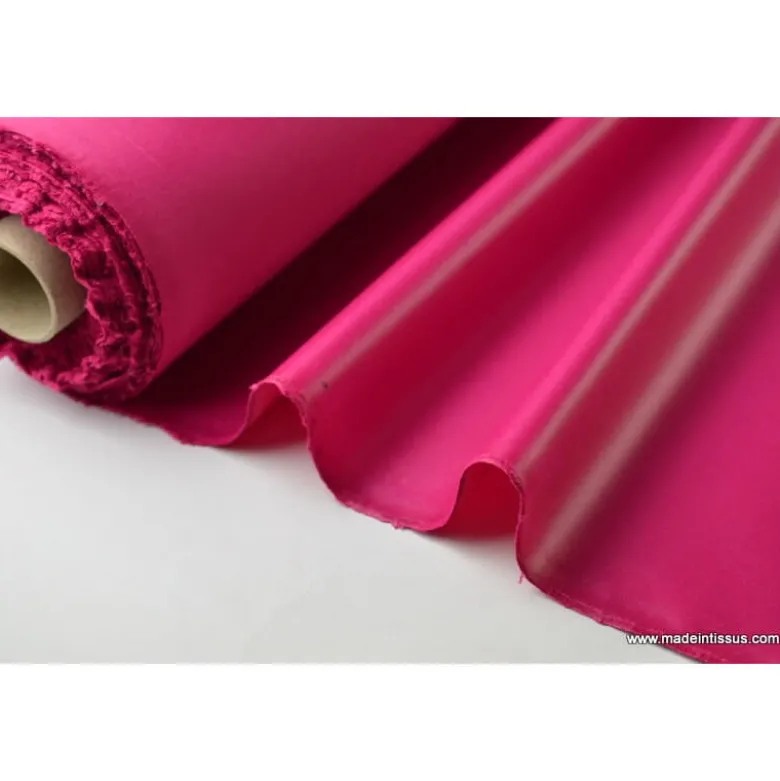 Tissu polyester fuchsia déperlant pour parapluie .