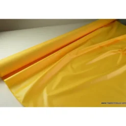 Tissu polyester jaune or déperlant pour parapluie .
