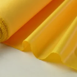Tissu polyester jaune or déperlant pour parapluie .