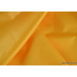 Tissu polyester jaune or déperlant pour parapluie .