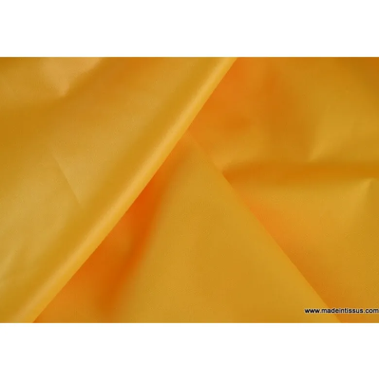 Tissu polyester jaune or déperlant pour parapluie .