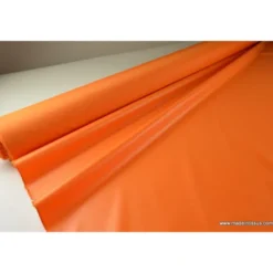 Tissu polyester orange déperlant pour parapluie .