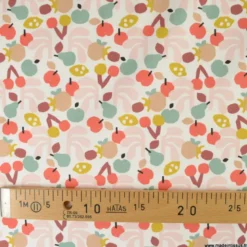 Tissu popeline Cancun motif fruits fond rose
