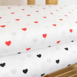 Tissu popeline de coton motif coeurs noirs fond blanc