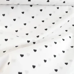 Tissu popeline de coton motif coeurs noirs fond blanc