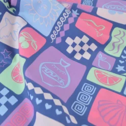 Tissu popeline de coton Poppy – motif patchwork d'été fond jean