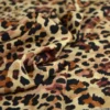 Tissu popeline de viscose Leolynx motif léopard chocolat fond beige