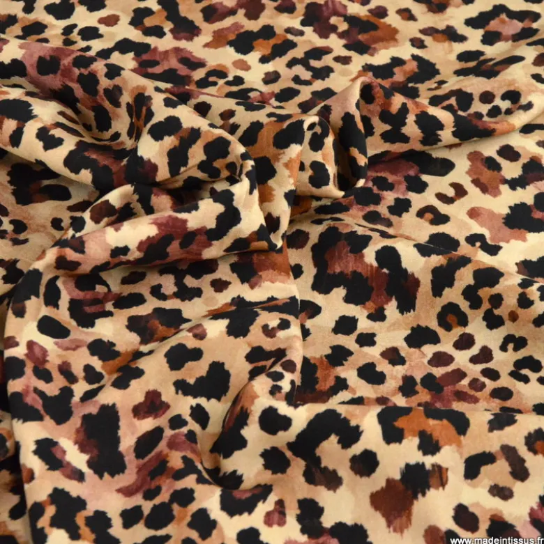 Tissu popeline de viscose Leolynx motif léopard chocolat fond beige