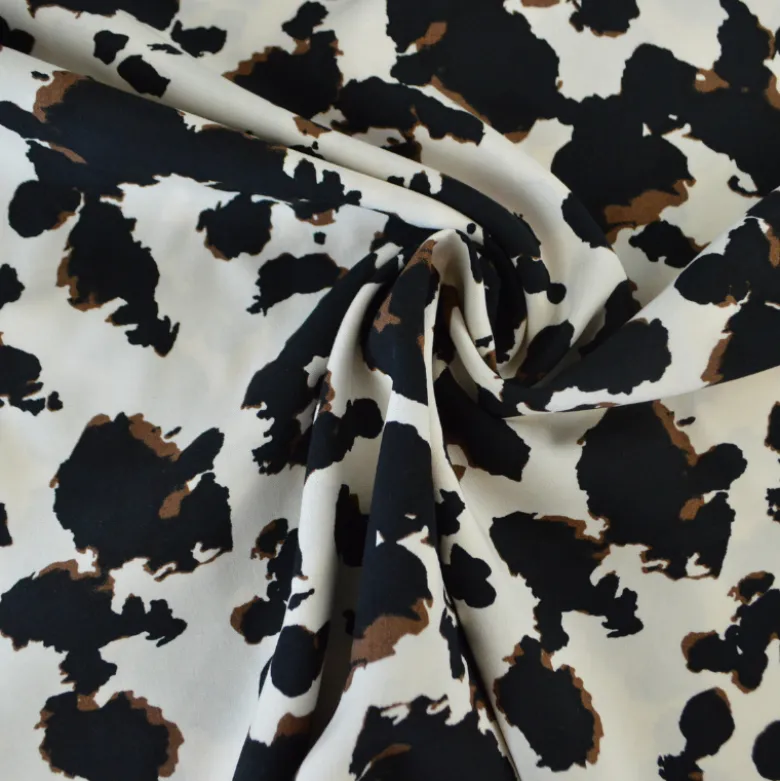 Tissu popeline de viscose - motif graphique typé léopard fond écru
