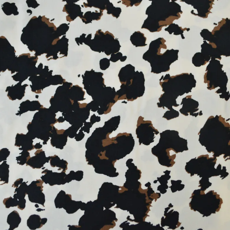 Tissu popeline de viscose - motif graphique typé léopard fond écru