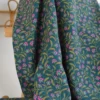 Tissu popeline de viscose motif petites fleurs roses fond vert