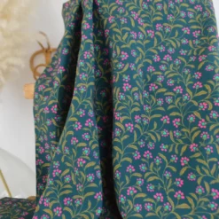 Tissu popeline de viscose motif petites fleurs roses fond vert