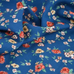 Tissu popeline de viscose Sylore - motif fleurs marsala fond bleu