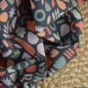 Tissu popeline motif amphores, fruits et feuilles graphique marsala et rose fond marine - exclusif