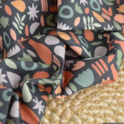 Tissu popeline motif amphores, fruits et feuilles graphique marsala et rose fond marine - exclusif