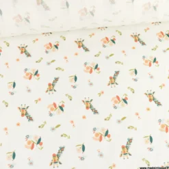 Tissu popeline motif girafes et fleurs roses fond bleu - Oeko tex