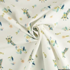 Tissu popeline motif girafes et fleurs bleues fond bleu - Oeko tex