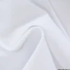 Tissu pour pantalon d'équitation maille stretch blanc.