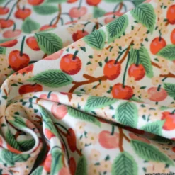Tissu Rifle Paper motif fleurs de cerisiers et cerises fond écru - Collection Garden Party