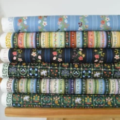 Tissu Rifle Paper motif fleurs et rayures Bleu - Collection Gracie