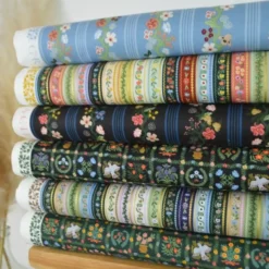 Tissu Rifle Paper motif rayures vertes, lilas et bleu - Collection Gracie