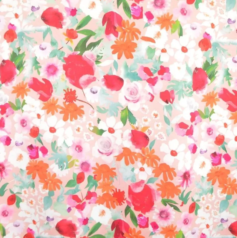 Tissu Satin de viscose fleuri fond rose poudré